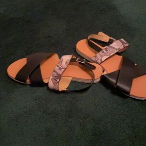 Black and snake flat sandals